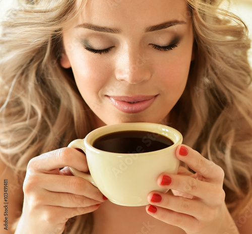 Coffee. Beautiful Girl Drinking Tea or Coffee. Cup of Hot Bevera