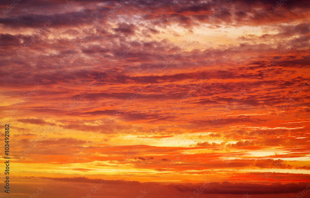 Fototapeta premium Fiery orange sunset sky. Beautiful apocalyptic sunset sky.