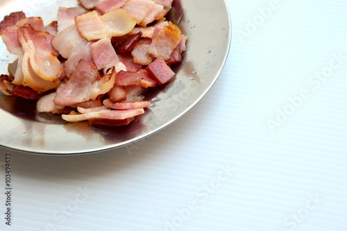 sliced bacon in dish