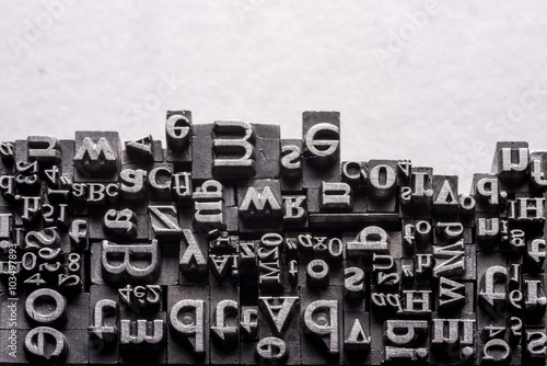 Typographical.
Different metal characters, it used to print documents
