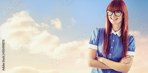 Composite image of attractive hipster woman with crossed arms