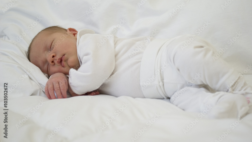 A newborn baby sleeping A newborn baby sleeping
