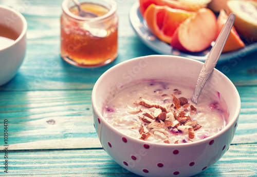 Hot Oatmeal with fresh fruit for healthy breakfast