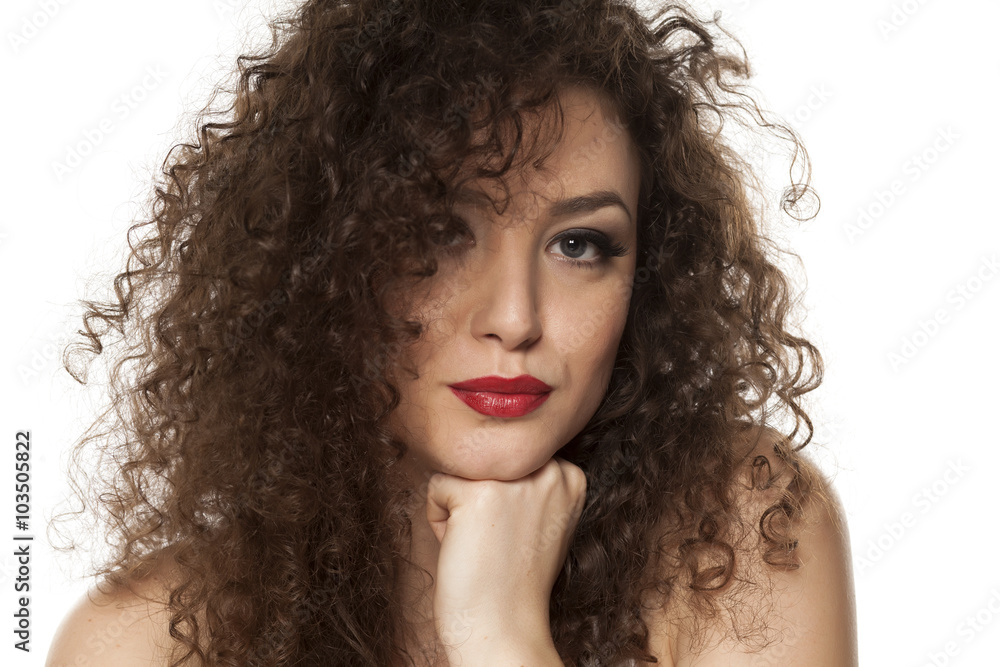 beautiful girl with long curly hair on a white background Stock Photo ...