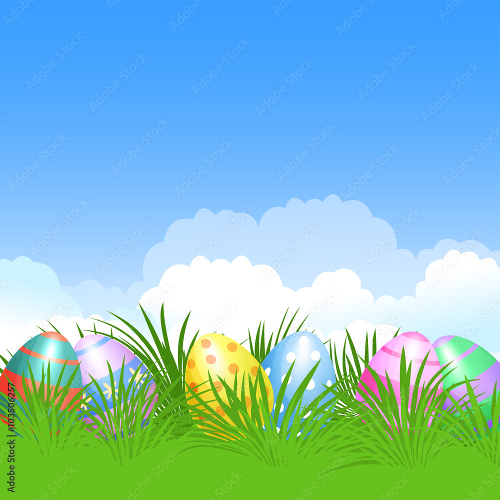 Easter background and colorful Easter eggs in green grass