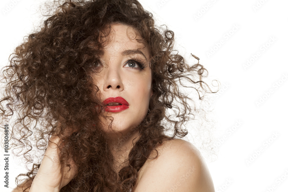 beautiful girl with long curly hair on a white background Stock Photo ...