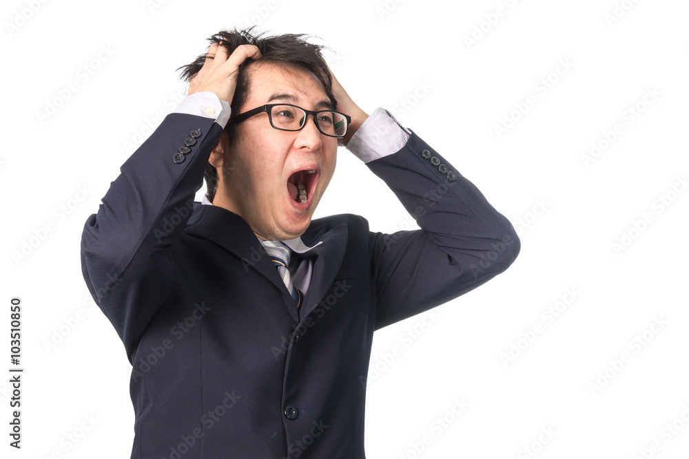 Asian handsome businessman holding his head frowning with worry. Asian handsome businessman holding his head frowning with worry.