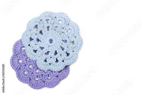 crochet thread of beautiful cloth in the form of a circle on a w