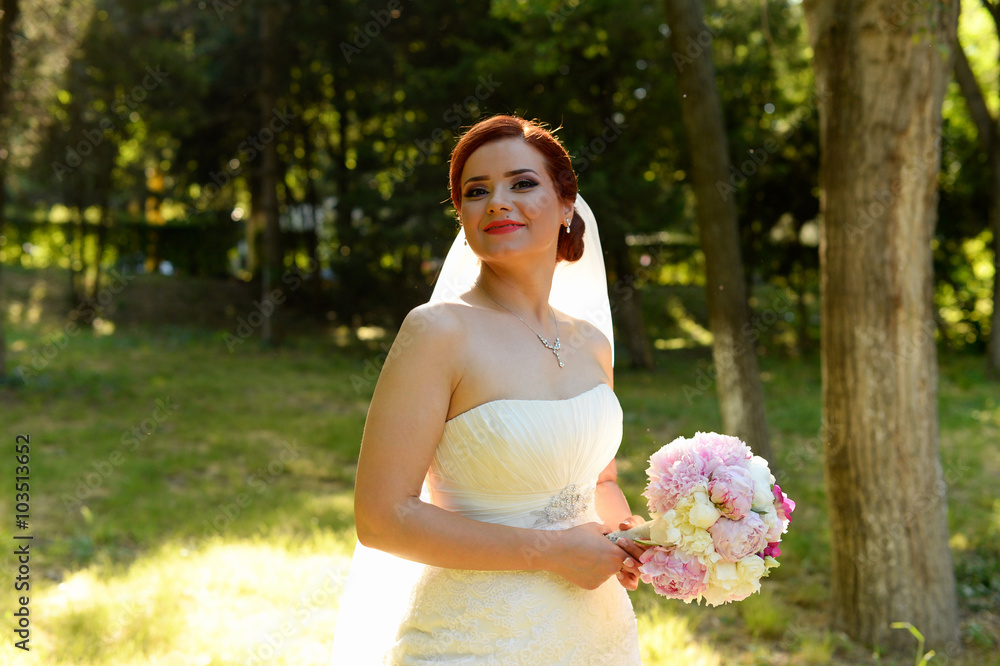 Beautiful bride on wedding day with bouquet Beautiful bride on wedding day with bouquet