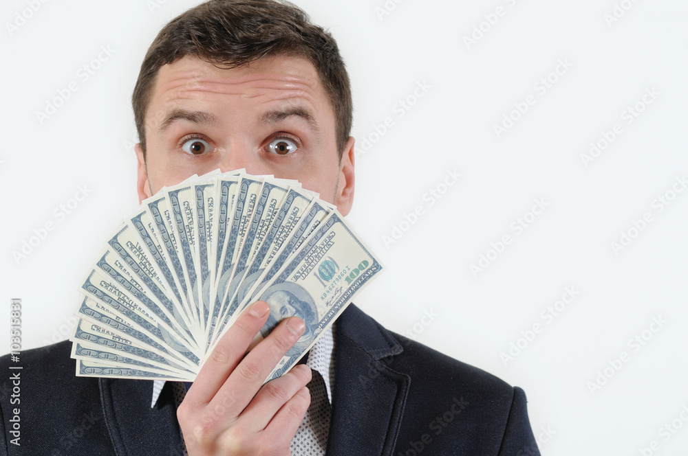 Businessman with money in studio on a white background Businessman with money in studio on a white background