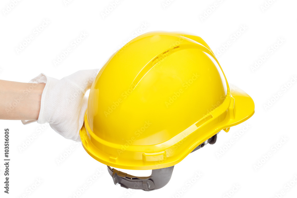 Construction helmet in the hand, isolated Construction helmet in the hand, isolated