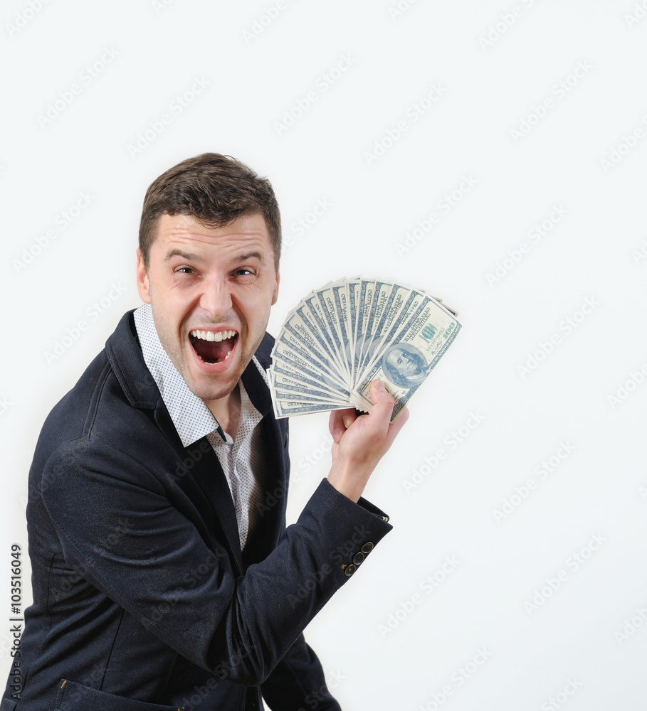 happy businessman with money in studio on a white background happy businessman with money in studio on a white background