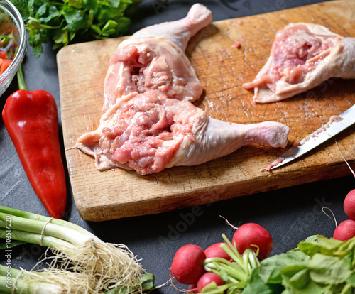 Preparing chicken with vegetables
