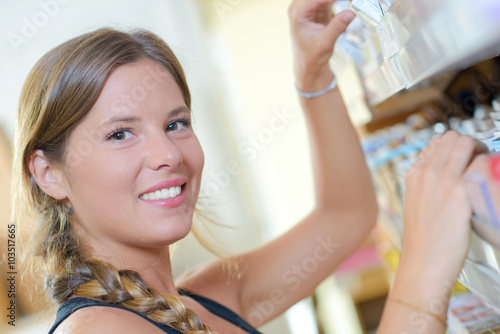 girl working in cigarette shop