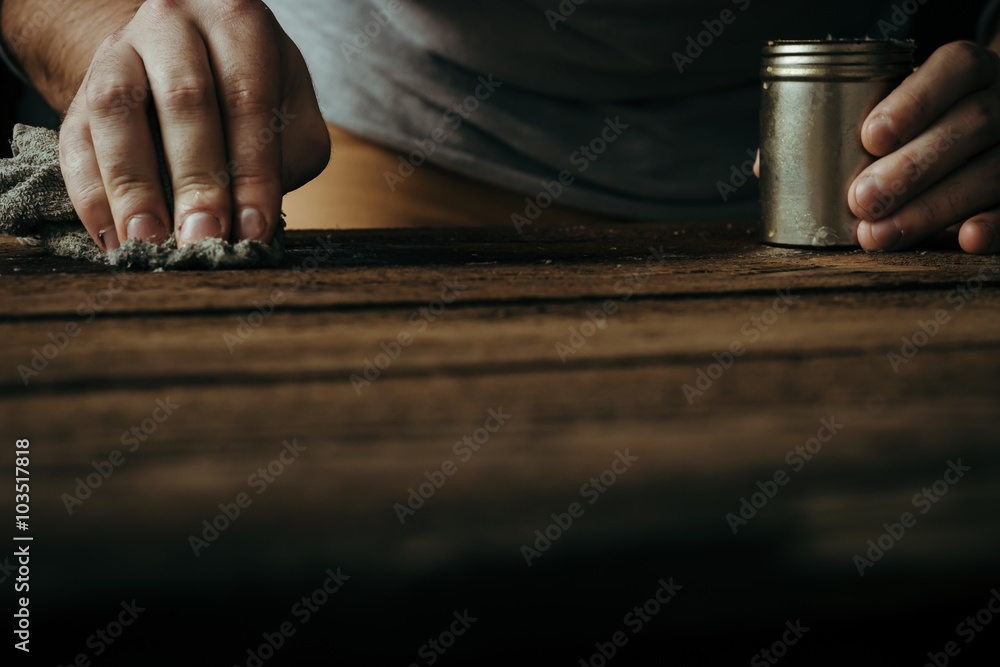 POV male hands on wooden desk