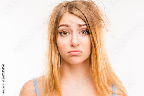 Upset girl with problem hair