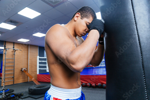 Boxer resting in gym © Drobot Dean