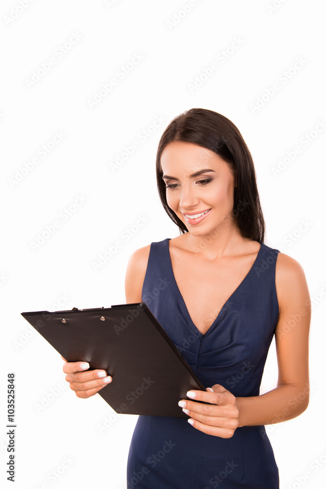 Portrait of beautiful businesswoman with clipboard in her hands Portrait of beautiful businesswoman with clipboard in her hands