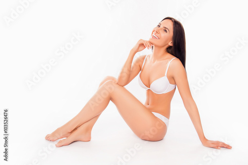 Sexy sensetive pretty woman posing in white lingerie