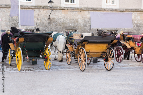 historic coaches in the historic oldtown of salzburg