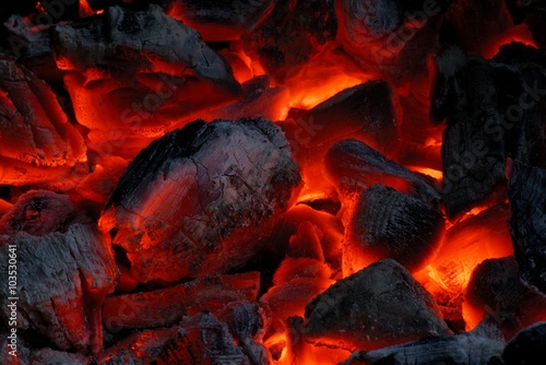 Hot coals in the campfire.