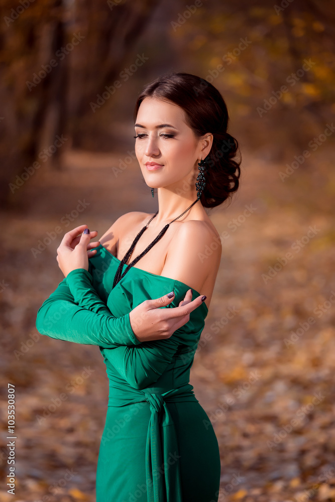 Lady in a luxury lush emerald dress ,fantastic shot,fairytale princess is walking in the autumn forest,fashionable toning,creative computer colors Lady in a luxury lush emerald dress ,fantastic shot,fairytale princess is walking in the autumn forest,fashionable toning,creative computer colors