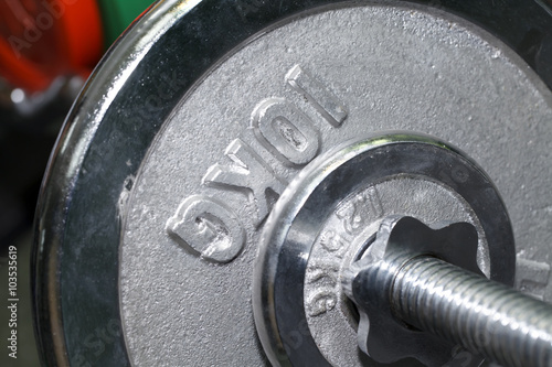 Barbell closeup , health and sports background