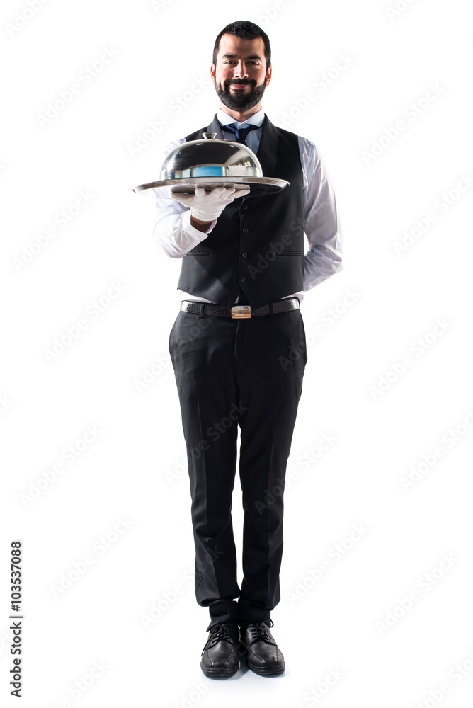 Luxury waiter holding a tray Luxury waiter holding a tray