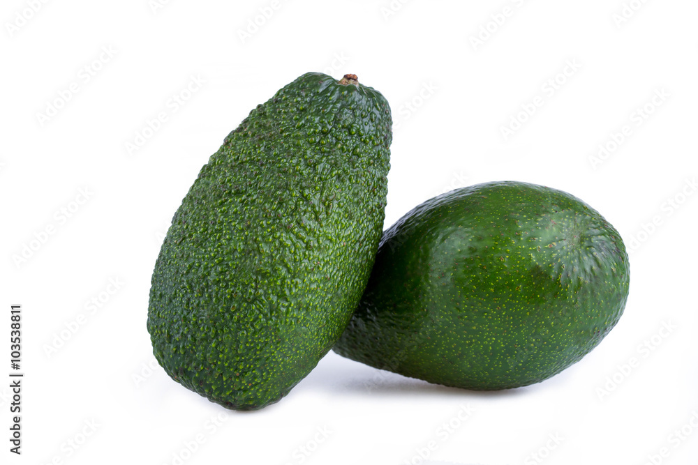 Two avocados isolated on a white background. Two avocados isolated on a white background.