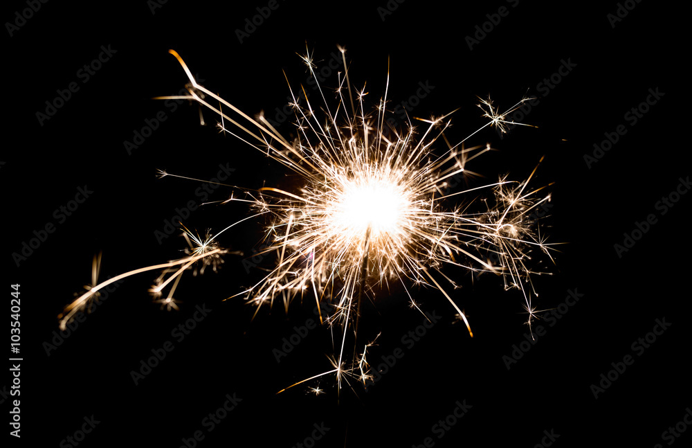 Sparkler little firework on black background. Use for Christmas