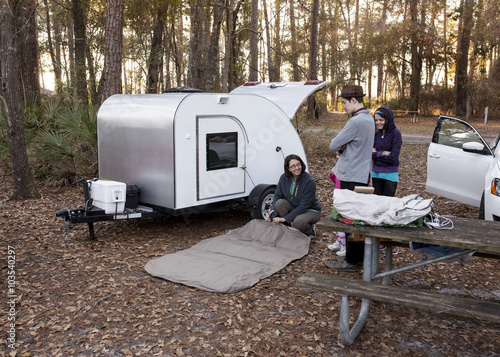 Family camping with teardrop trailer