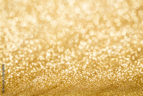 Golden blur bokeh abstract background.