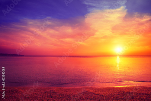 Morning on the beach. Magical sunrise over sea