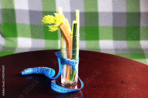 glass with vegetables diet mesaure photo