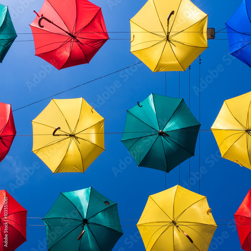 Colorful umbrellas against the sky