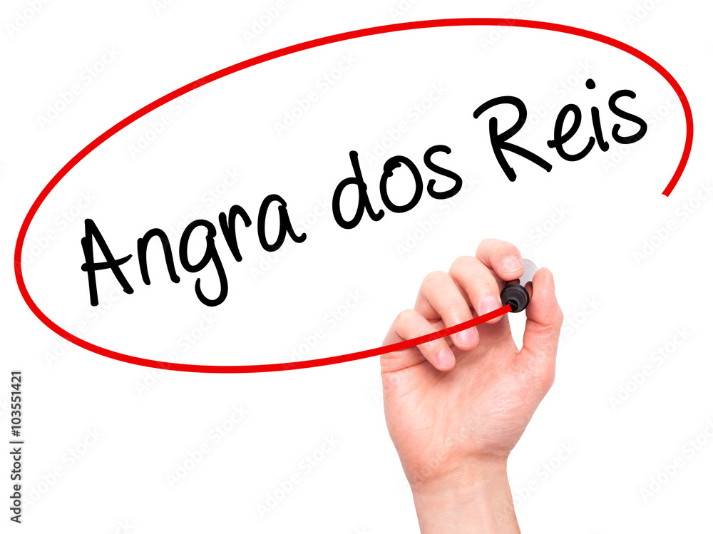 Man Hand writing Angra dos Reis with black marker on visual scre Man Hand writing Angra dos Reis with black marker on visual scre