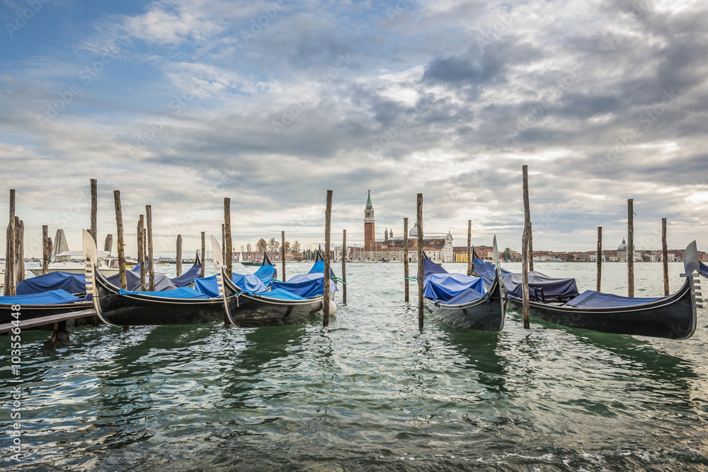 Gondolas in lagoon of Venice and San Giorgio island in background, Italy, Europe
