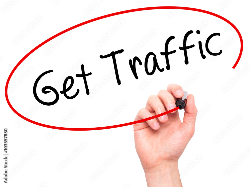 Man Hand writing Get Traffic with black marker on visual screen Man Hand writing Get Traffic with black marker on visual screen