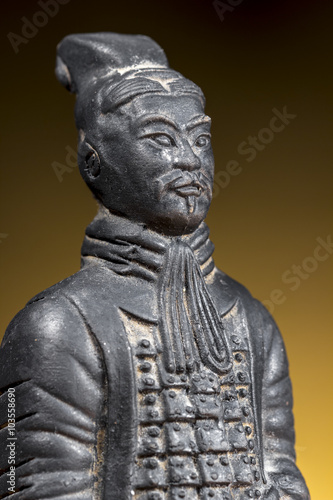 Ancient chinese warrior. Terracotta figurine.