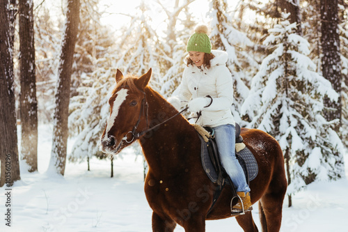 beautiful girl and horse in winter © Rustam Shigapov