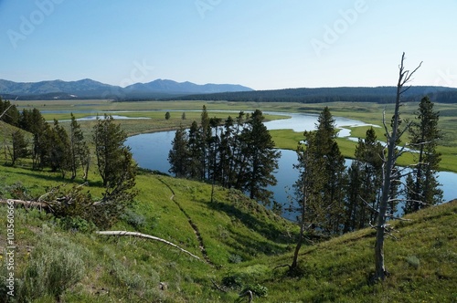 View over the course of the Yellowstone River from a hillside.