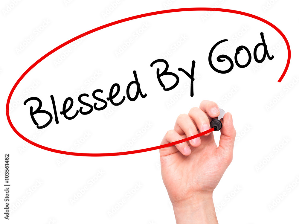 Man Hand writing Blessed By God with black marker on visual scre Man Hand writing Blessed By God with black marker on visual scre