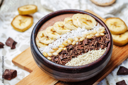 chocolate smoothie with banana, coconut, pine nuts, chocolate an