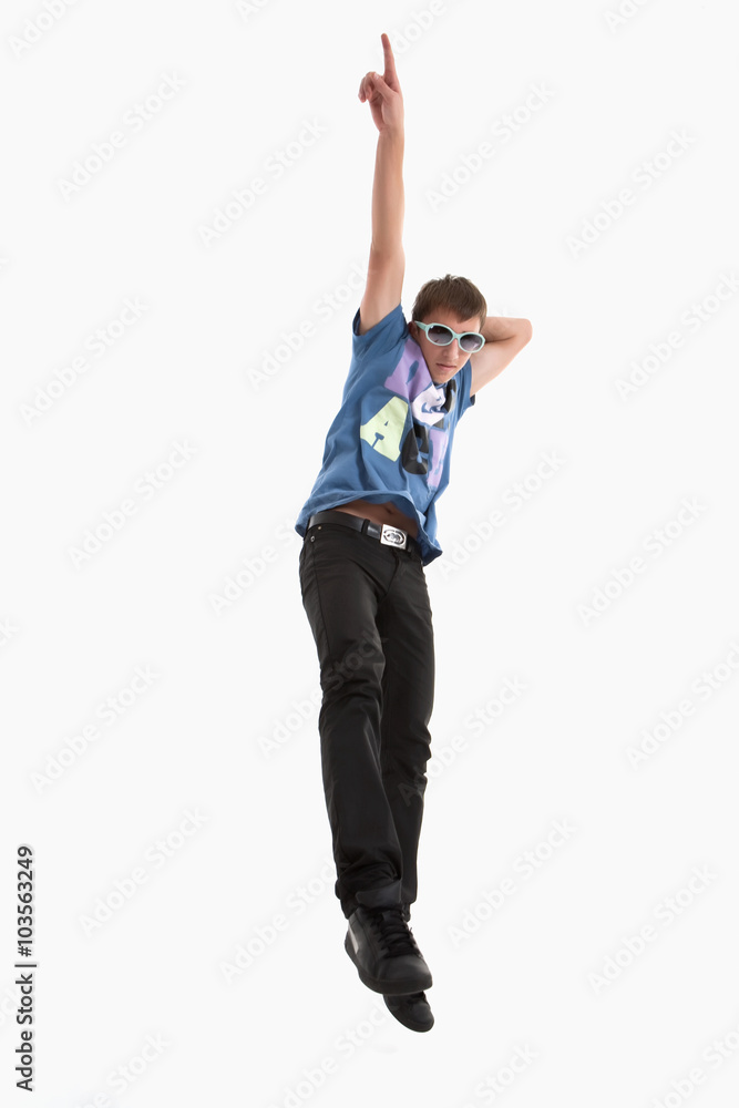 Young guy is dancing. Street dance. White background. Young guy is dancing. Street dance. White background.