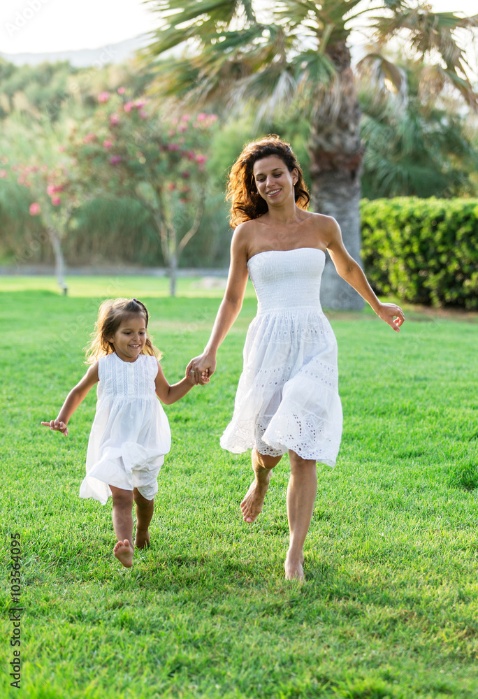 Mother and daughter are resting in the country side. Mother and daughter are resting in the country side.