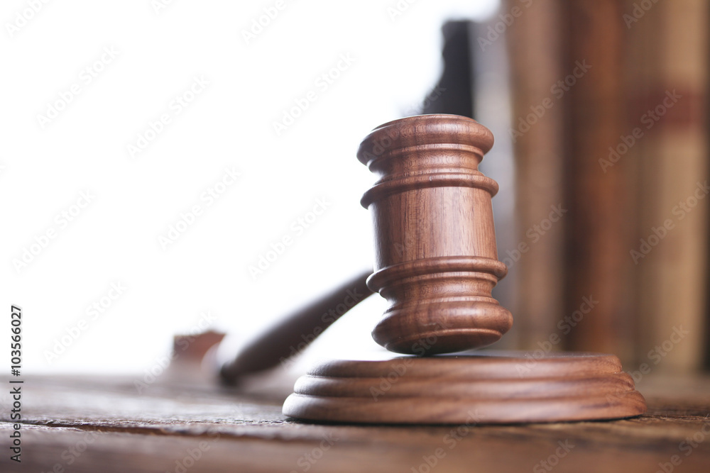 Law theme, mallet of judge, wooden gavel, books Law theme, mallet of judge, wooden gavel, books