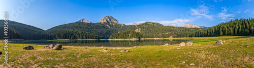 Panoramic photo of the glacial Black lake located on mount Durmitor, nature in Montenegro continental part.
