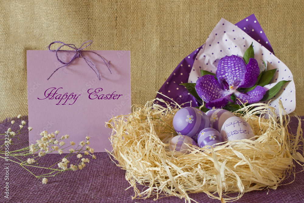 Still life of Easter eggs in a straw nest Still life of Easter eggs in a straw nest