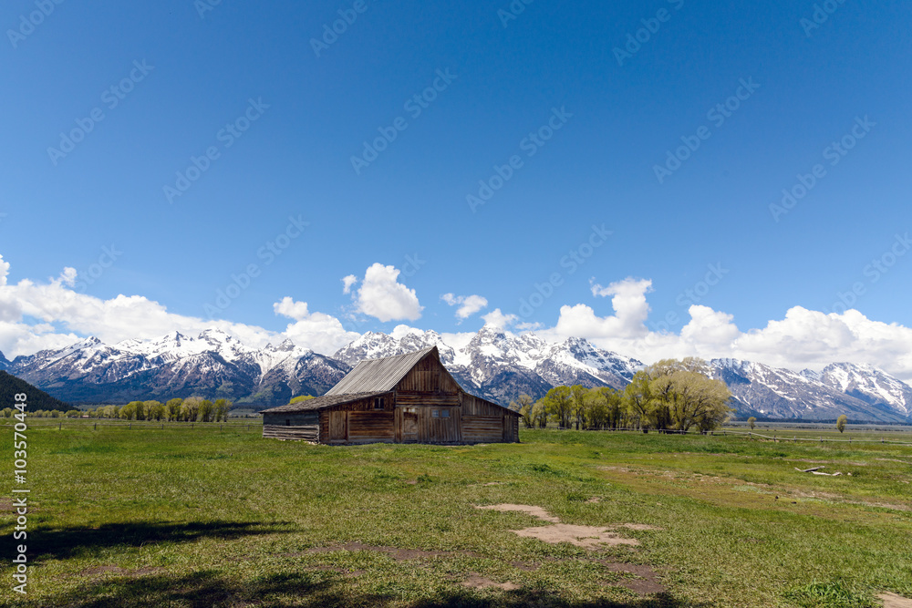 Old Mormon Barn in the Tetons / The Moulton Barn and the Teton Mountain Range in Grand Teton National Park, Wyoming.