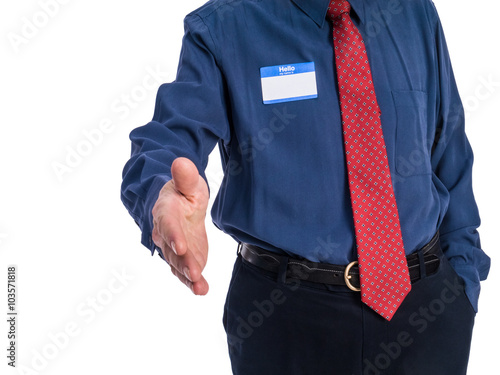 Photo of senior man in a blue shirt and red tie wearing a 
